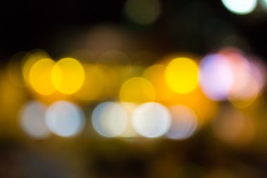 Bokeh efektli bulanık ışıkların soyut arkaplanı