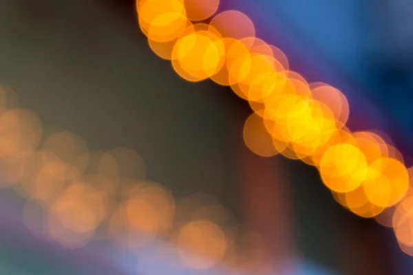Abstract background of blurred lights with bokeh effect — Stock Photo, Image