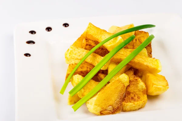 Slide fried potatoes — Stock Photo, Image
