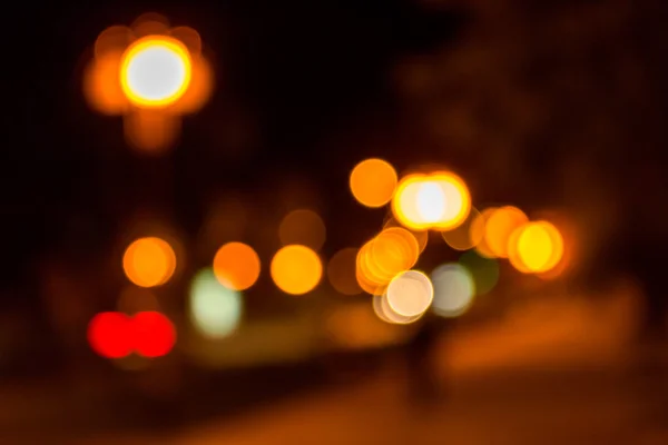 Warm city blur of night lanterns — Stock Photo, Image