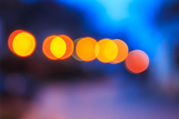 Abstract background of blurred lights with bokeh effect — Stock Photo, Image