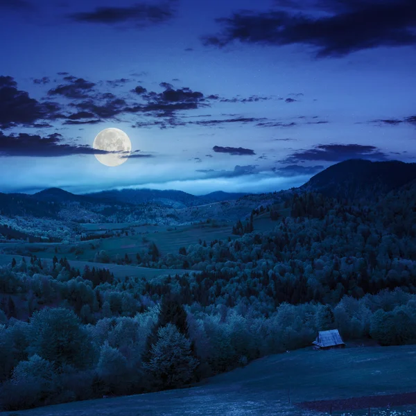 Meadow on  hillside meadow in mountain at night — Stock Photo, Image
