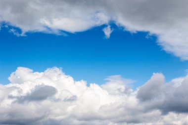 grey clouds on a blue sky. calm nature background. weather change before the rain