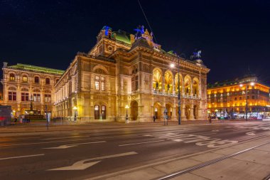 vienna, austria - oct 17, 2019: facade of famous opera house at night. popular travel destination