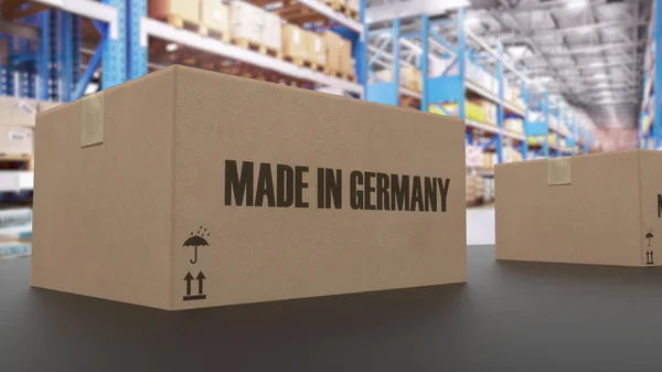コンベア上のドイツ語のテキストで作られたボックス アメリカ製品関連 3Dレンダリング — ストック写真