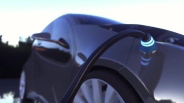 Şarj kablosu prize takıldı. Elektrikli araç modern EV 'yi şarj ediyor. Elektrikli arabayı şarj eden fiş.