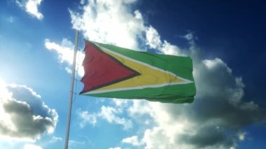 Guyana bayrağı güzel mavi gökyüzüne doğru esen rüzgara karşı