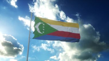 Güzel mavi gökyüzüne karşı rüzgarda sallanan Komoros bayrağı