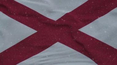 Kar taneleri arka planında Alabama kış bayrağı. Amerika Birleşik Devletleri