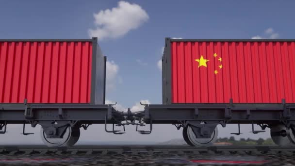 Containers with the flag of China. Railway transportation — стоковое видео