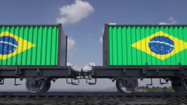 Containers with the flag of Brazil. Railway transportation