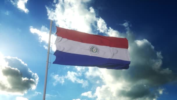 Flag of Paraguay waving at wind against beautiful blue sky — Stock video
