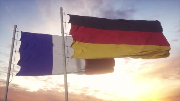 法国和德国在旗杆上悬挂国旗.法国和德国在风中飘扬着国旗.法国和德国的外交概念 — 图库视频影像