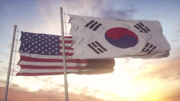 韩国和美国的国旗在旗杆上。韩国和美国在风中飘扬国旗.韩国和美国的外交概念 — 图库视频影像