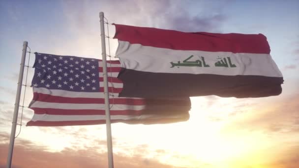 Drapeau de l'Irak et des États-Unis sur mât. Irak et États-Unis agitant le drapeau dans le vent. Irak et États-Unis concept diplomatique — Video