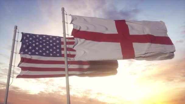Vlajka Anglie a Spojených států na vlajkovém stožáru. Anglie a USA mávají vlajkou ve větru. England and United States diplomatic concept — Stock video