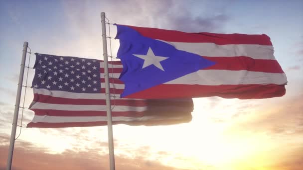 푸에르토리코와 미국의 국기가 깃대에 걸려 있다. 푸에르토리코와 미국은 바람에 휘날리는 깃발을 흔들고 있습니다. 푸에르토리코와 미국의 외교 개념 — 비디오