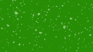 Yeşil ekran arkaplanında yalıtılmış düşen kar.