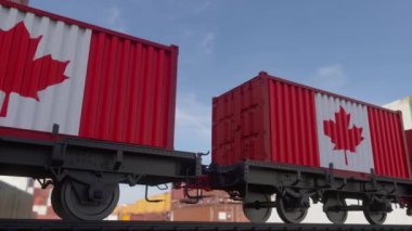 Containers with the flag of Canada. Railway transportation.