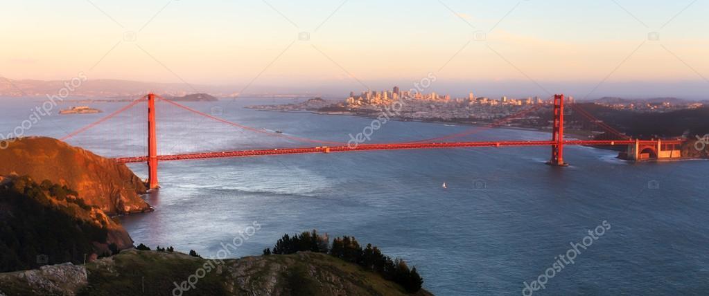 sunset panoramic view of the Golden Gate Bridge from the peak of