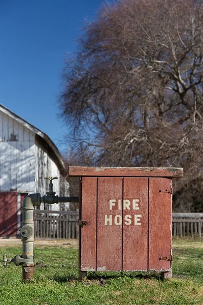 Caja de manguera de fuego de moda antigua — Foto de Stock