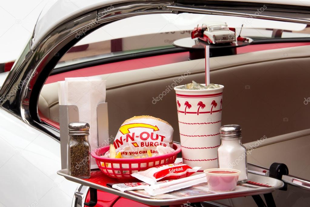 Depiction In-N-Out Burger drive-in restaurant at the Pasadena Police Class Car Show and Chalk Festival. In-N-Out Burgers, Inc. is a regional chain of fast food restaurants with locations the United States Southwest.