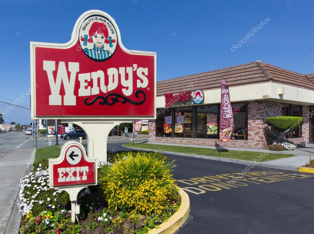 Wendy's fast food restaurant exterior and sign. Wendy's is the world's third largest hamburger fast food chain with approximately 6,650 locations.