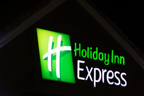 Holiday Inn Express Sign at night — Stock Photo, Image