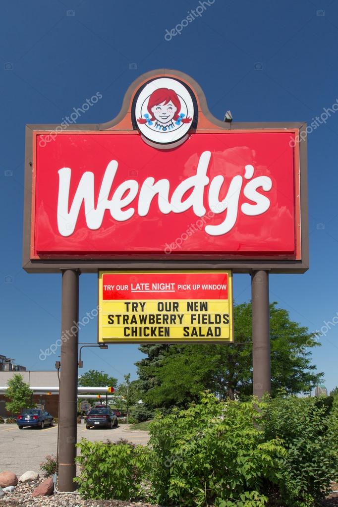 Wendy's fast food restaurant exterior and sign. Wendy's is the world's third largest hamburger fast food chain with approximately 6,650 locations.
