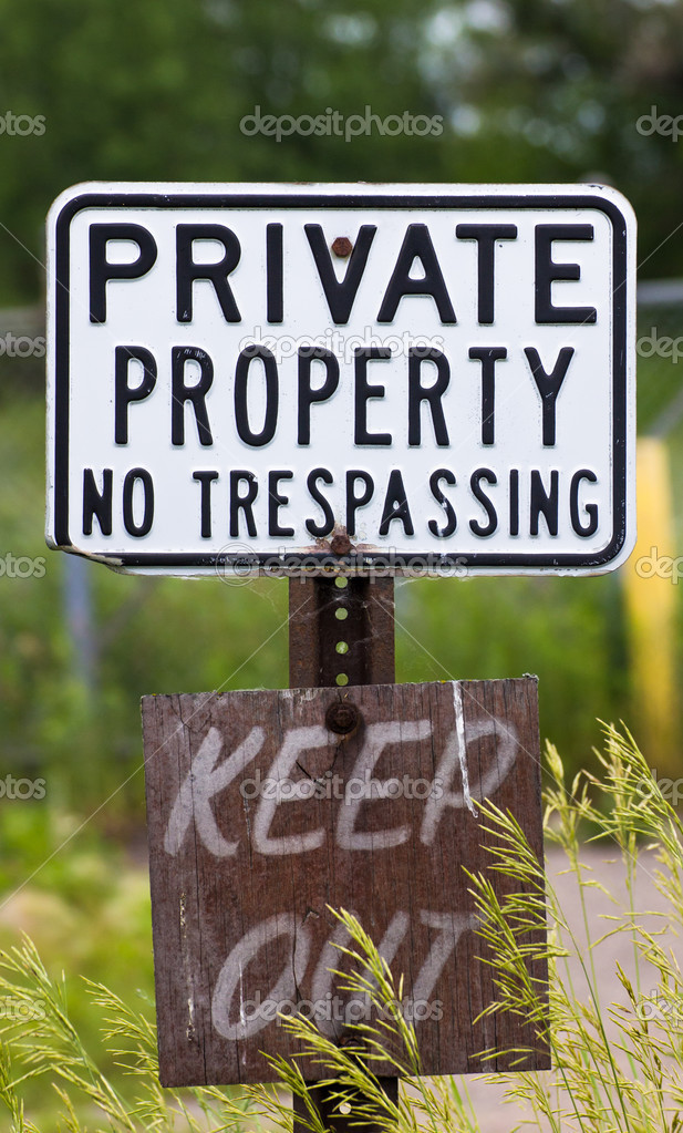 Weathered No Trespassing Sign