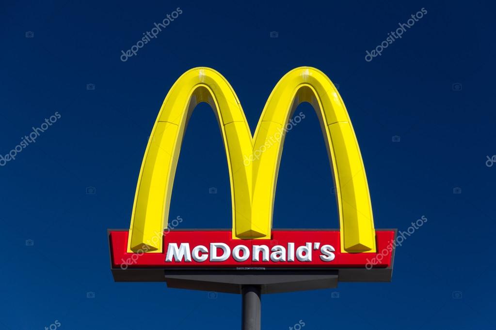 McDonald' sign. The McDonald's Corporation is the world's largest chain of hamburger fast food restaurants.