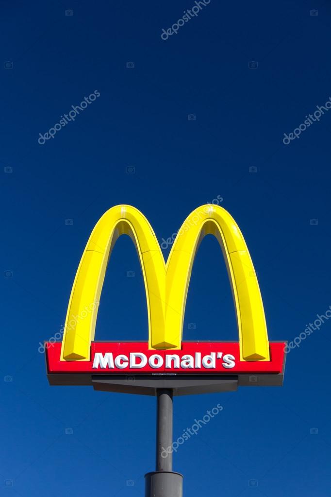 McDonald' sign. The McDonald's Corporation is the world's largest chain of hamburger fast food restaurants.