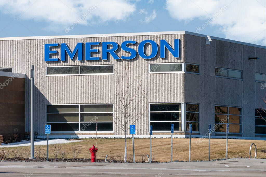 CHANHASSEN, MN, USA - MARCH 20, 2022: Emerson Electic manufacturing facility and trademark logo.