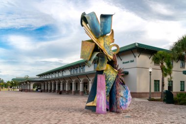 FORT MYERS, FL, USA - JULY 6, 2022: Cross Currents Sculpture and Howard Hal at Florida Gulf Coast University.