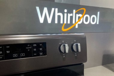 HUDSON, WI, USA - AUGUST 11, 2022: Whirlpool retail store appliance display and trademark logo.