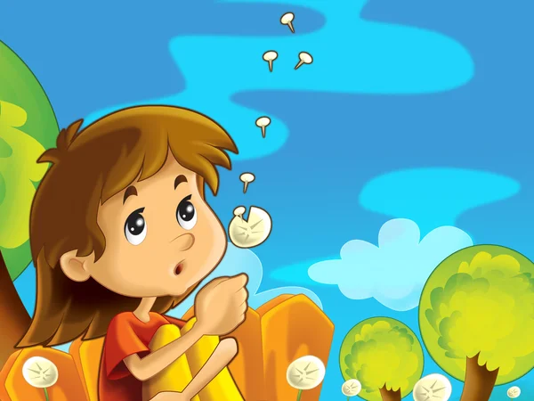 Child sitting on the meadow
