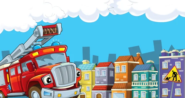 The red firetruck is driving through the city — Stock Photo, Image