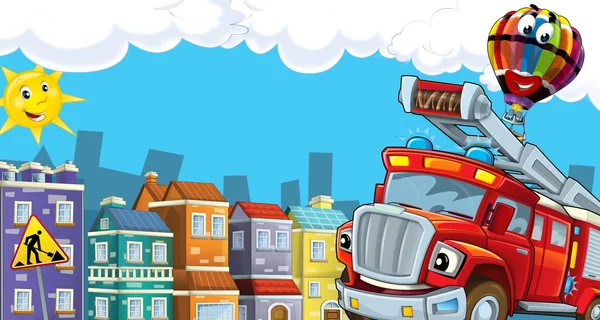 The red firetruck is driving through the city — Stock Photo, Image
