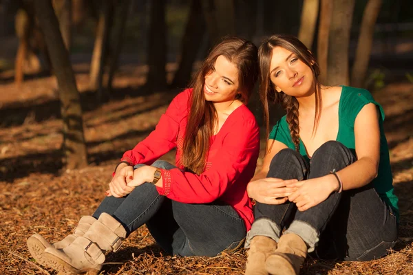 Young girlfriends playing on a park — Stock Photo, Image