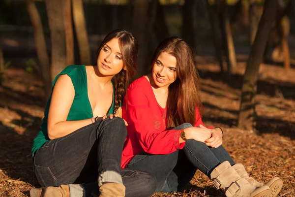 Young girlfriends playing on a park — Stock Photo, Image