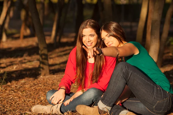 Young girlfriends playing on a park — Stock Photo, Image