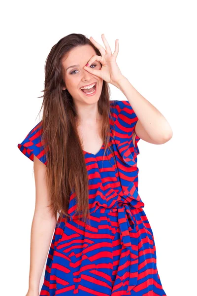 Young beautiful women happy making hole gestures on face — Stock Photo, Image