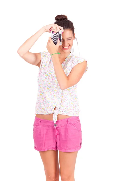 Young women taking pictures with vintage camera — Stock Photo, Image