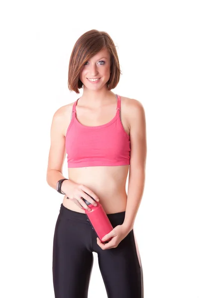 Young beautiful sport woman portrait with a bottle isolated on w — Stock Photo, Image