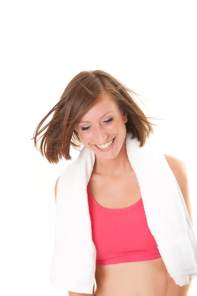 Young beautiful sport woman laughing with a towel isolated on wh — Stock Photo, Image