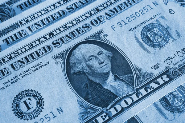 アメリカのお金をクローズアップ 1米ドル紙幣にテクスチャ紙の表面 米国の経済とビジネス 連邦準備制度のメモ 青の着色された背景や壁紙 マクロ — ストック写真