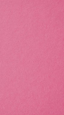 Soluk kırmızı-mor karton yüzey. Selüloz lifli kağıt dokusu. Cep telefonu duvar kağıdı. Dikey açık kırmızı arkaplan ve pastel renkli. Pembe desenli pasifik arka planı. Makro