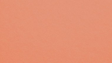 Şeftali rengi karton yüzey. Selüloz lifli kağıt dokusu. Pastel renkli, şeffaf bir arka plan. Kağıt duvar kağıdı. Yumuşak desenli ve arka planda. Makro