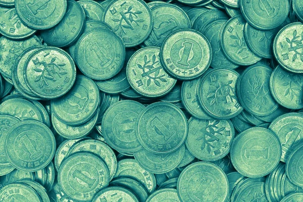 日本の表面1円硬貨が閉じます 緑と黄色の着色された背景や壁紙 中央銀行 日本経済の背景 マクロ — ストック写真