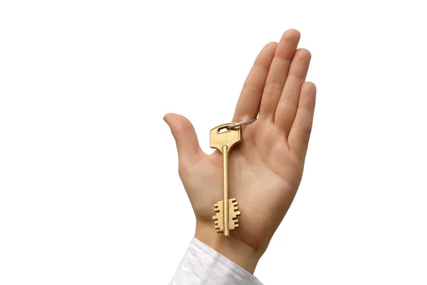 The hand holds a key highly. Isolated on white. — Stock Photo, Image